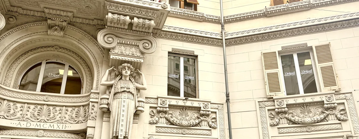 Palazzo liberty sede Assicurazioni Zara - Via XX Settembre 23 Genova con insegne Unipol